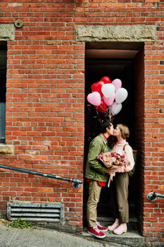Art Photography Couple kissing in doorway while on