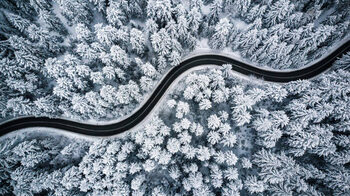 Illustration Curvy windy road in snow covered