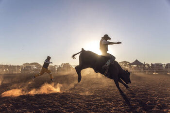 Impressão de arte Dust flying at a rodeo in