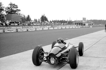 Valokuvataide Graham Hill in a BRM p61 monocoque in the pits, 1963