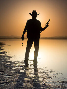 Impressão de arte Silhouette of a man with cowboy