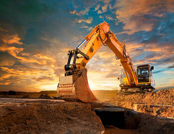 Canvas Print Excavator at a construction site against