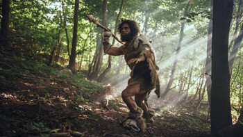 Canvas Print Primeval Caveman Wearing Animal Skin Holds