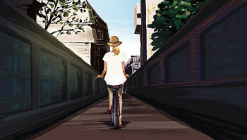 Canvas Print Rear view of woman riding bicycle