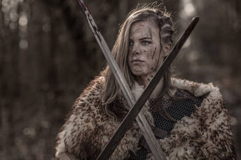 Canvas Print Sword wielding viking warrior young blond