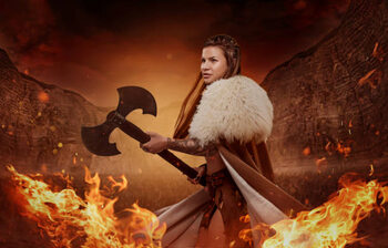 Canvas Print Viking inspired warrior female in a fire storm