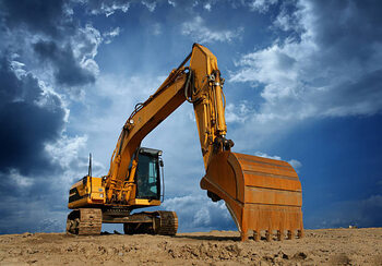 Canvas Print Yellow Excavator at Construction Site