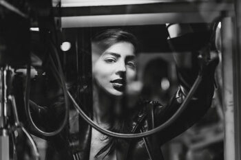 Poster A beautiful feminine woman in black