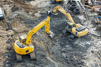 Poster Aerial view of diggers at construction site