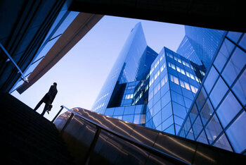 Poster Businessman on top of stairs at