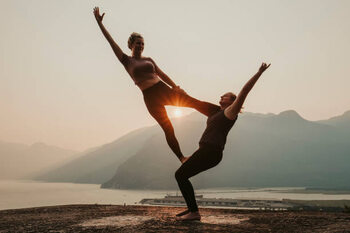 Плакат Two women do acroyoga on top