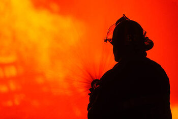 Плакат Silhouetted fireman