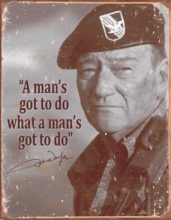 Metallikyltti John Wayne - Man's Gotta Do
