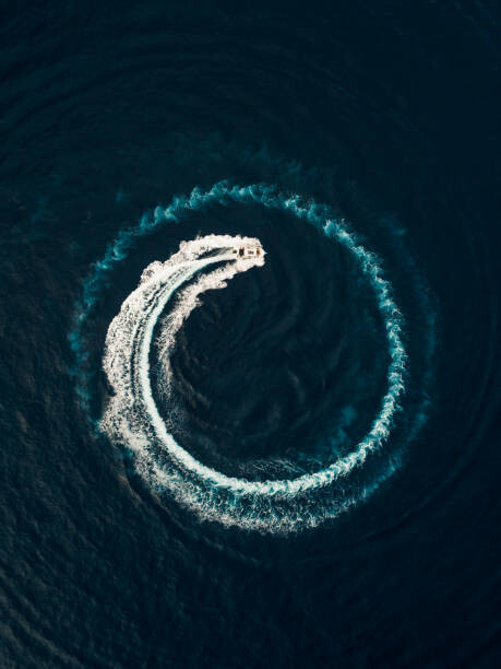 Art Photography Aerial view of a motorboat circling