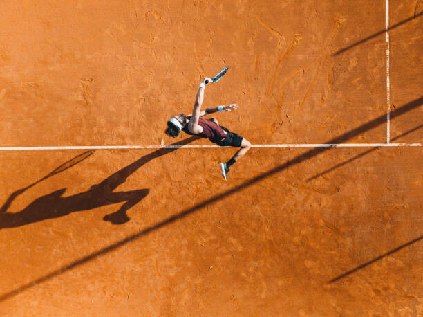 Art Photography Aerial view of a tennis player during a match
