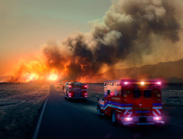 Art Photography Ambulance driving to forest fire in desert