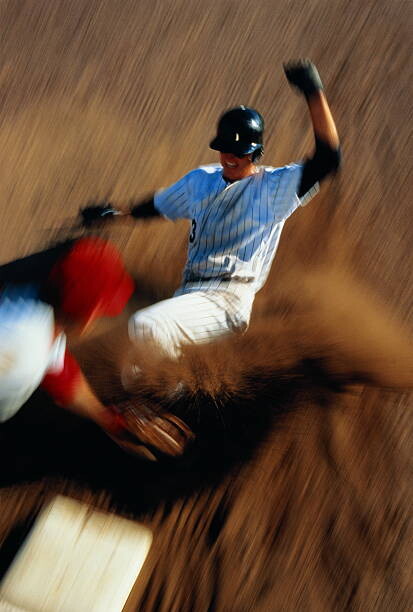 Valokuvataide Baseball, player sliding into third base