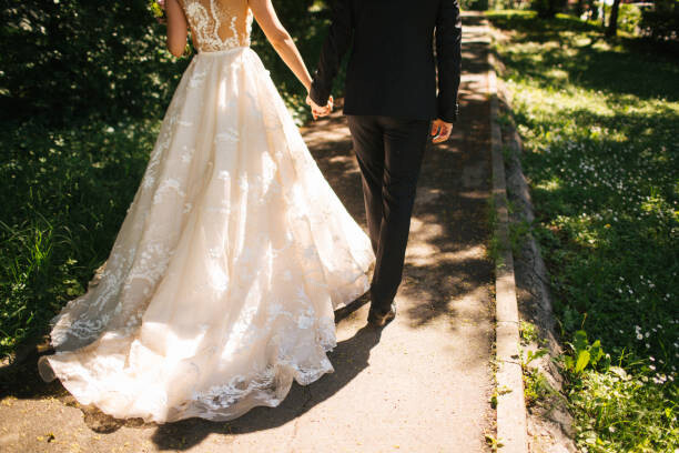 Art Photography Bride and groom walking on pavements