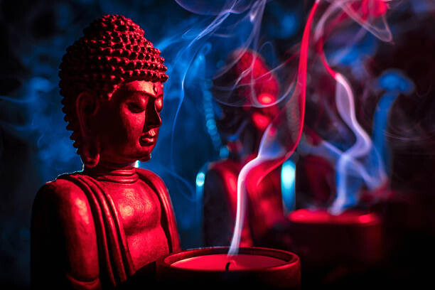 Buddha statue with candles print by Editors Choice