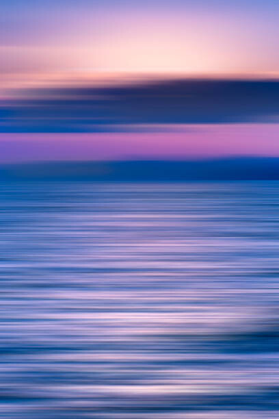 Art Photography Dreamy seascape sunset. Motion blur, vivid colors