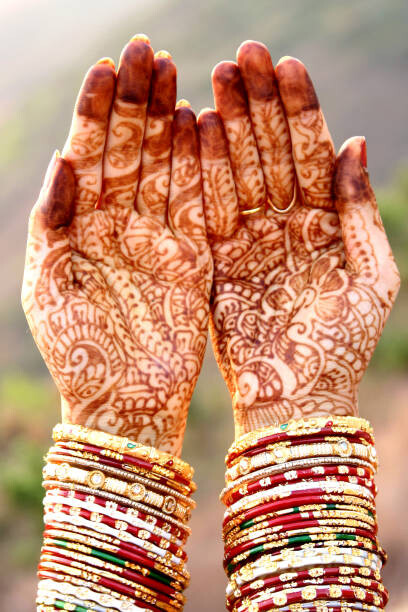 Art Photography Indian bride hands with henna tattoo