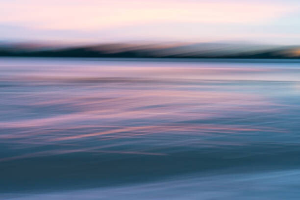 Valokuvataide Motion blur effect in coastal sunrise