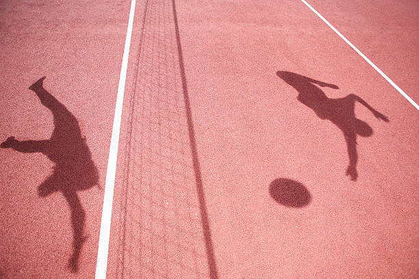Art Photography Shadows of athletes playing volleyball