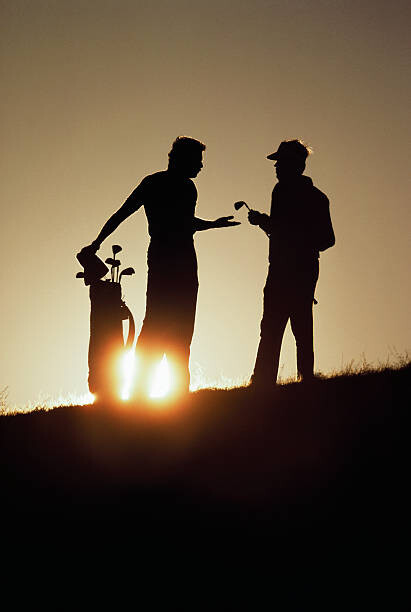 Art Photography Silhouetted Golfers Discussing Strategy
