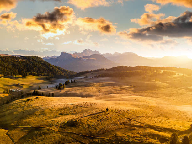 Art Photography Sunrise panorama of the Alpine mountains. Alpe di Siusi, Dolomites. Italy