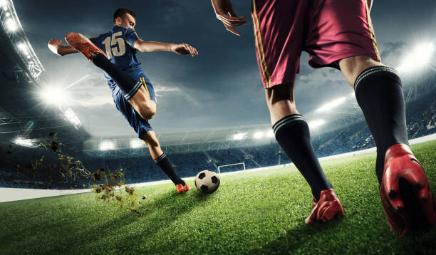 Arte Fotográfica Two men are playing soccer and