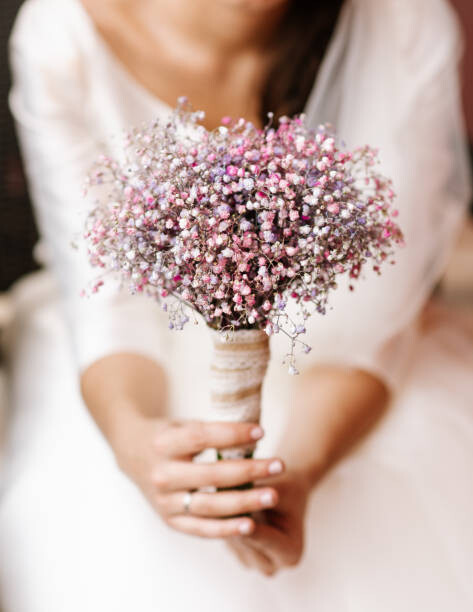 Art Photography Woman holding her bridal bouquet made