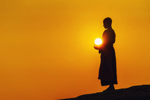 Canvas Print A monk standing meditation.