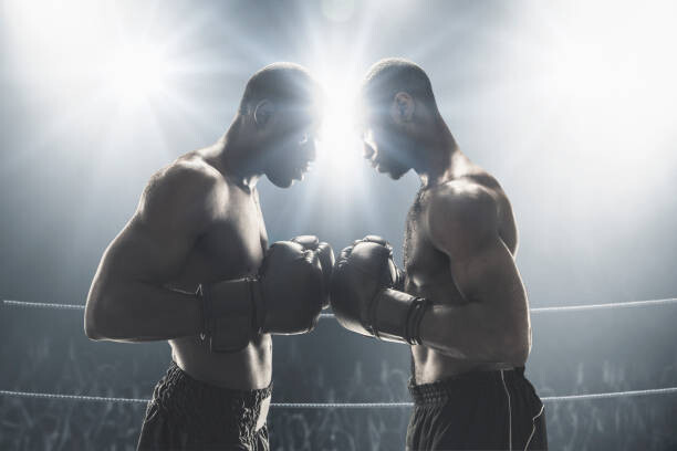Canvas Print African American boxers standing in boxing ring