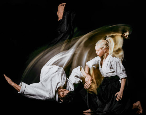 Canvas Print Aikido budokas man and woman isolated