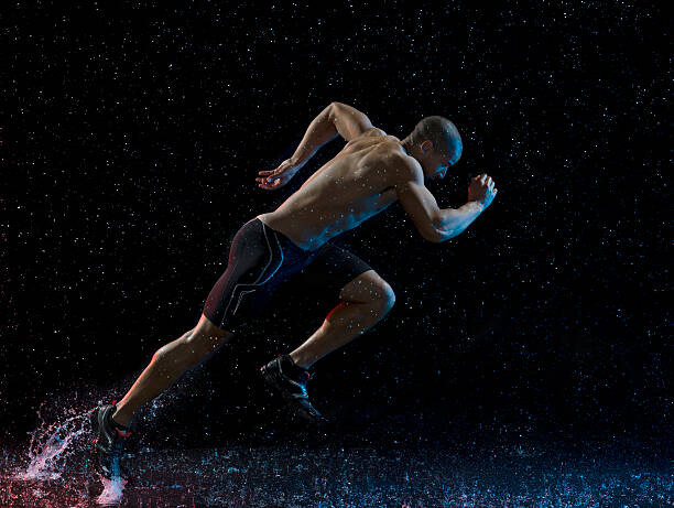 Canvas Print Athlete runner running through rain