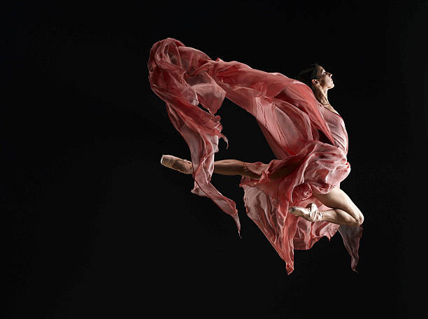 Canvas Print Ballet dancer wearing flowing dress in