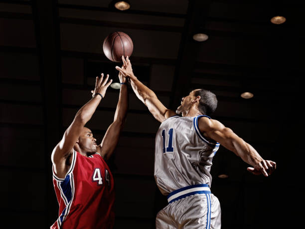 Canvas Print Basketball player trying to take basketball