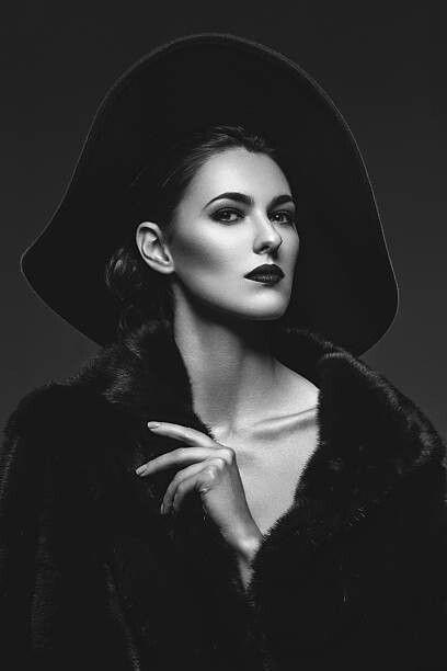 Canvas Print Beautiful girl in fur coat and hat