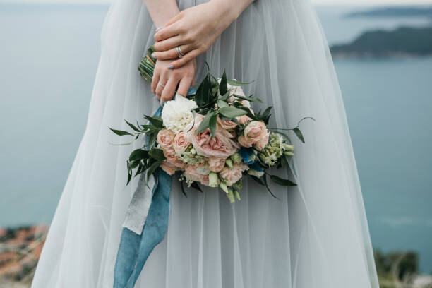 Canvas Print Bride holding a wedding bouquet