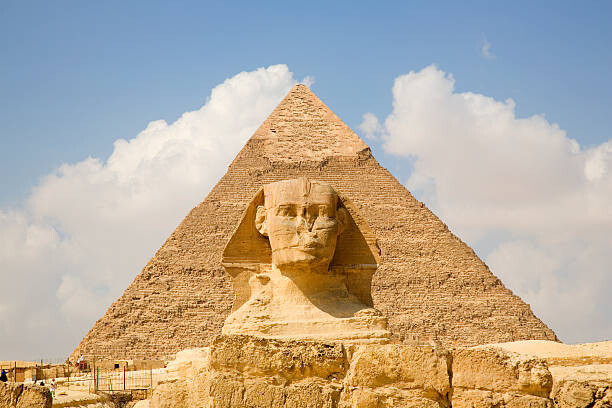 Canvas Print daytime view pyramid with sphinx foreground