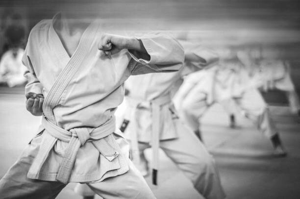 Canvas Print Elbow punch in karate. Children's training.
