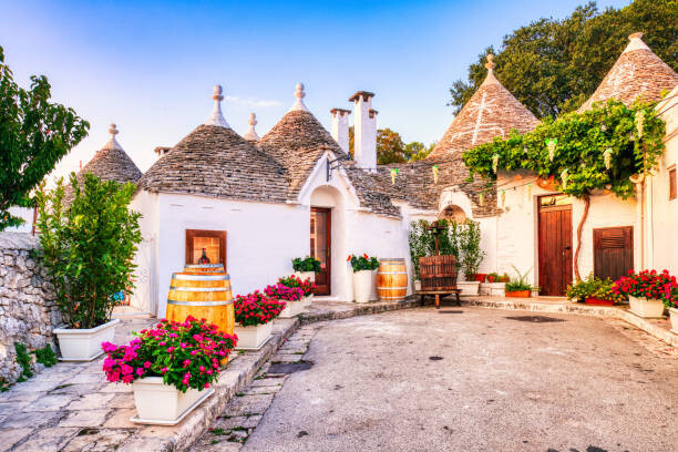 Canvas Print Famous Trulli Houses during a Sunny