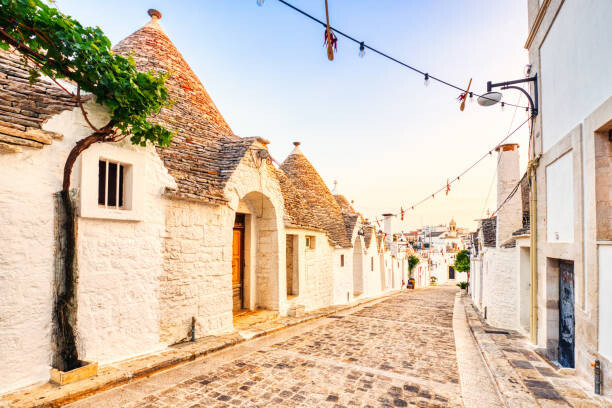 Canvas Print Famous Trulli Houses during a Sunny