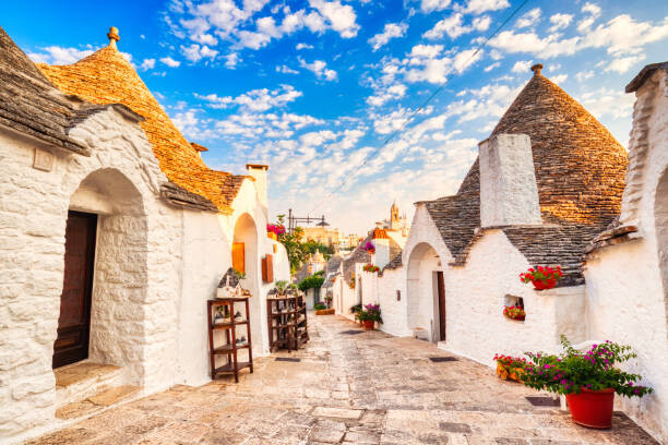 Canvas Print Famous Trulli Houses during a Sunny