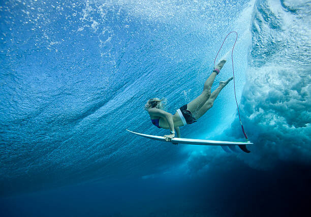Canvas Print Female Pro surfer at Cloud Break Fiji