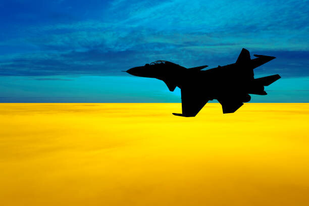 Canvas Print Fighter at sunset on the background