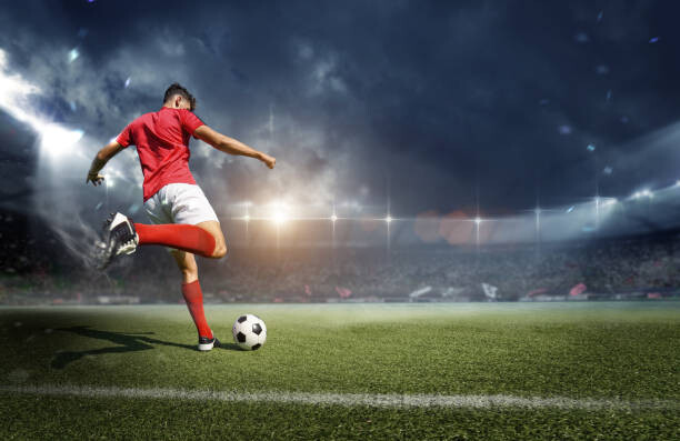 Canvas Print Football player in the stadium