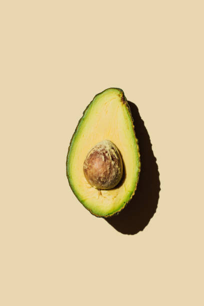 Canvas Print Fresh ripe green avocado fruit halves