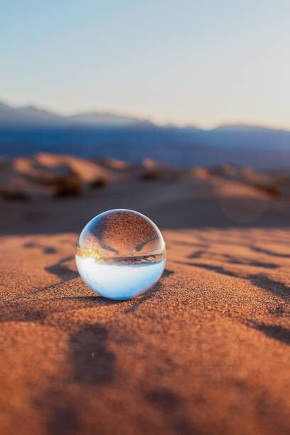 Canvas Print Glass Sphere on Desert Sand