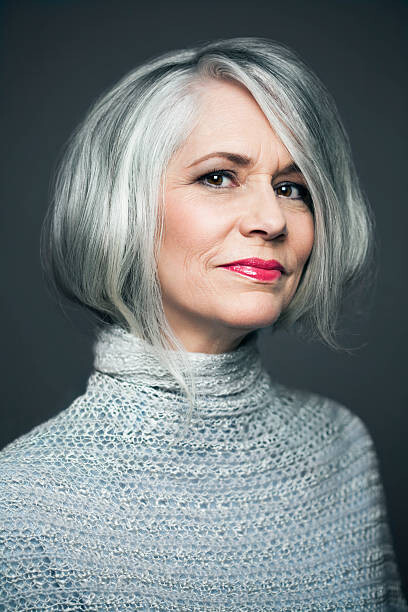 Canvas Print Grey haired lady with red lipstick, portrait.
